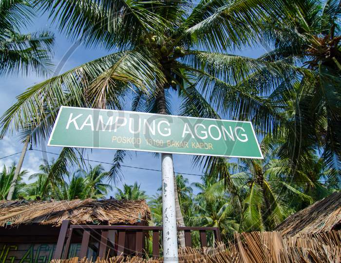 Kampung Agong Signboard In Coconut Farm