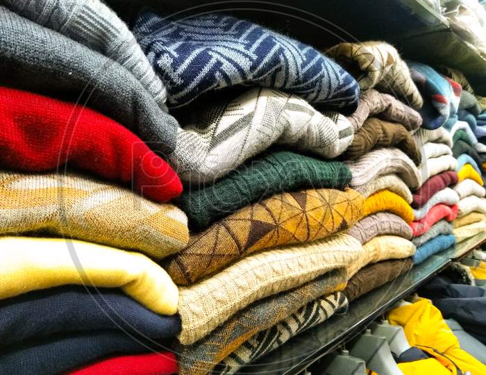 A Picture Of Clothes In Shop With Selective Focus