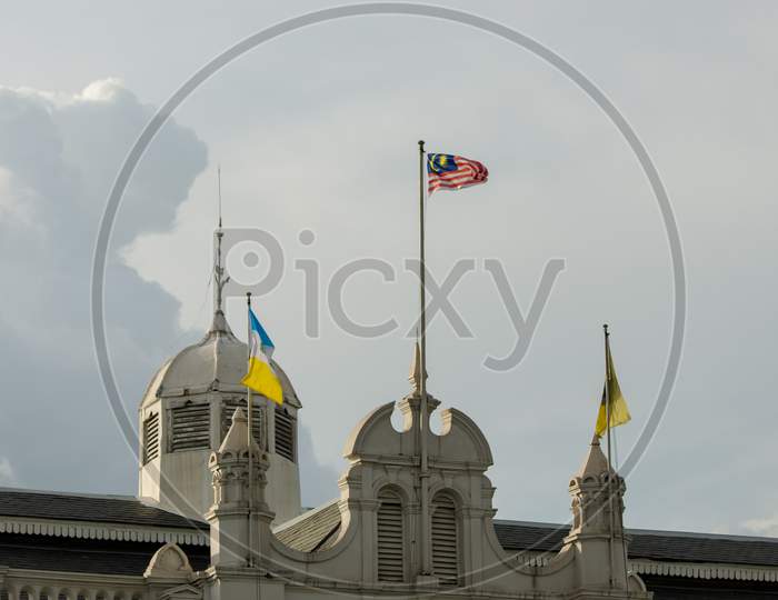 Waving Malaysia Flag At Rooftop City Hall
