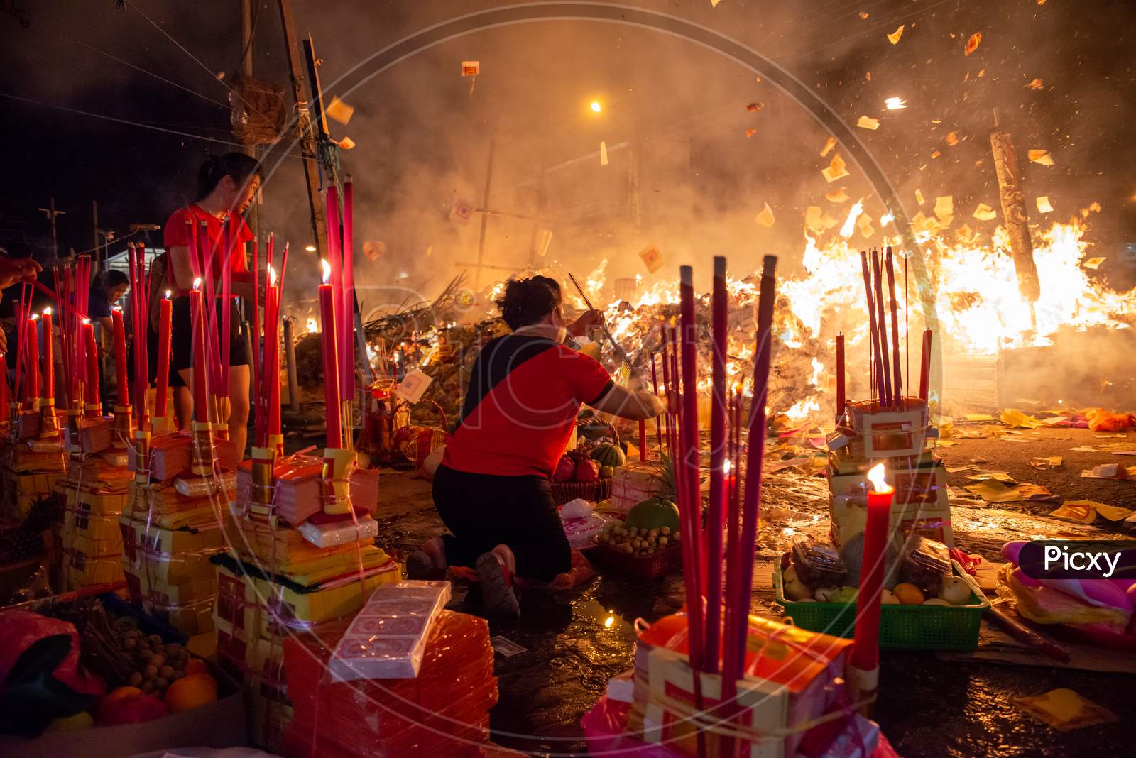 Chinese Devotees Pray With Joss Paper And Stick During Hungry Ghost Festival