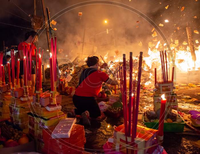 Chinese Devotees Pray With Joss Paper And Stick During Hungry Ghost Festival