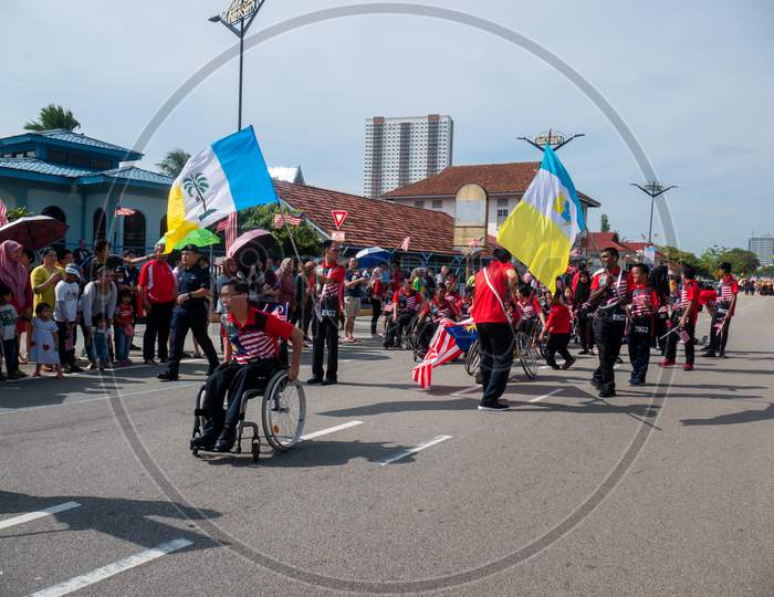 Men In Wheel Chair Join Malaysia Independence Parade