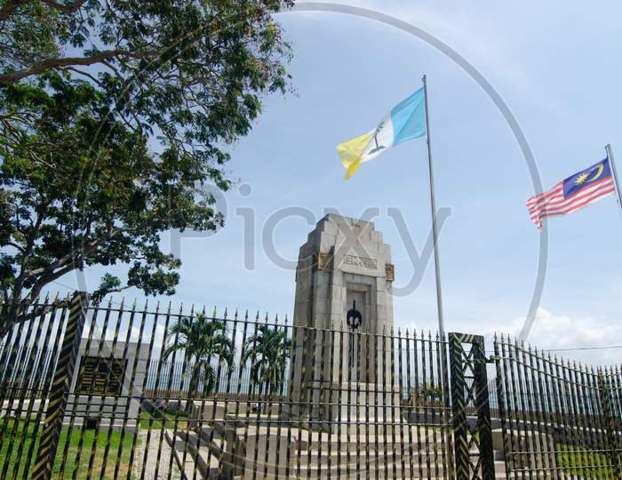 The Cenotaph War Memorial With Malaysia And Penang Flag Waving