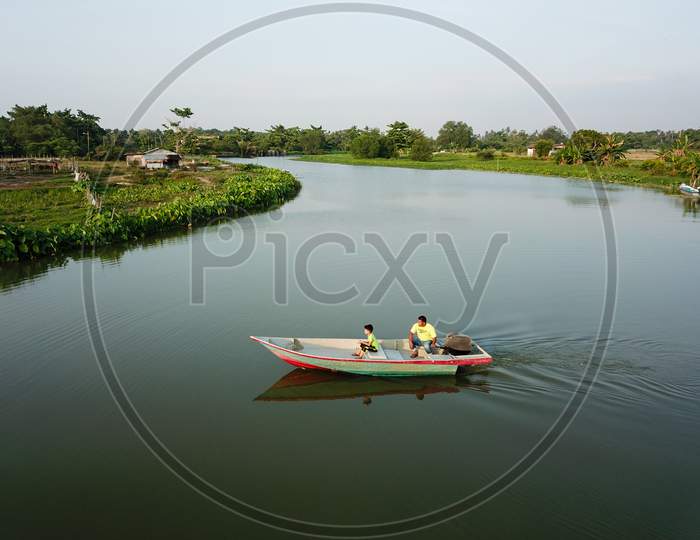 Local Malays Family Go To Fishing With Boat At Kampung Terus