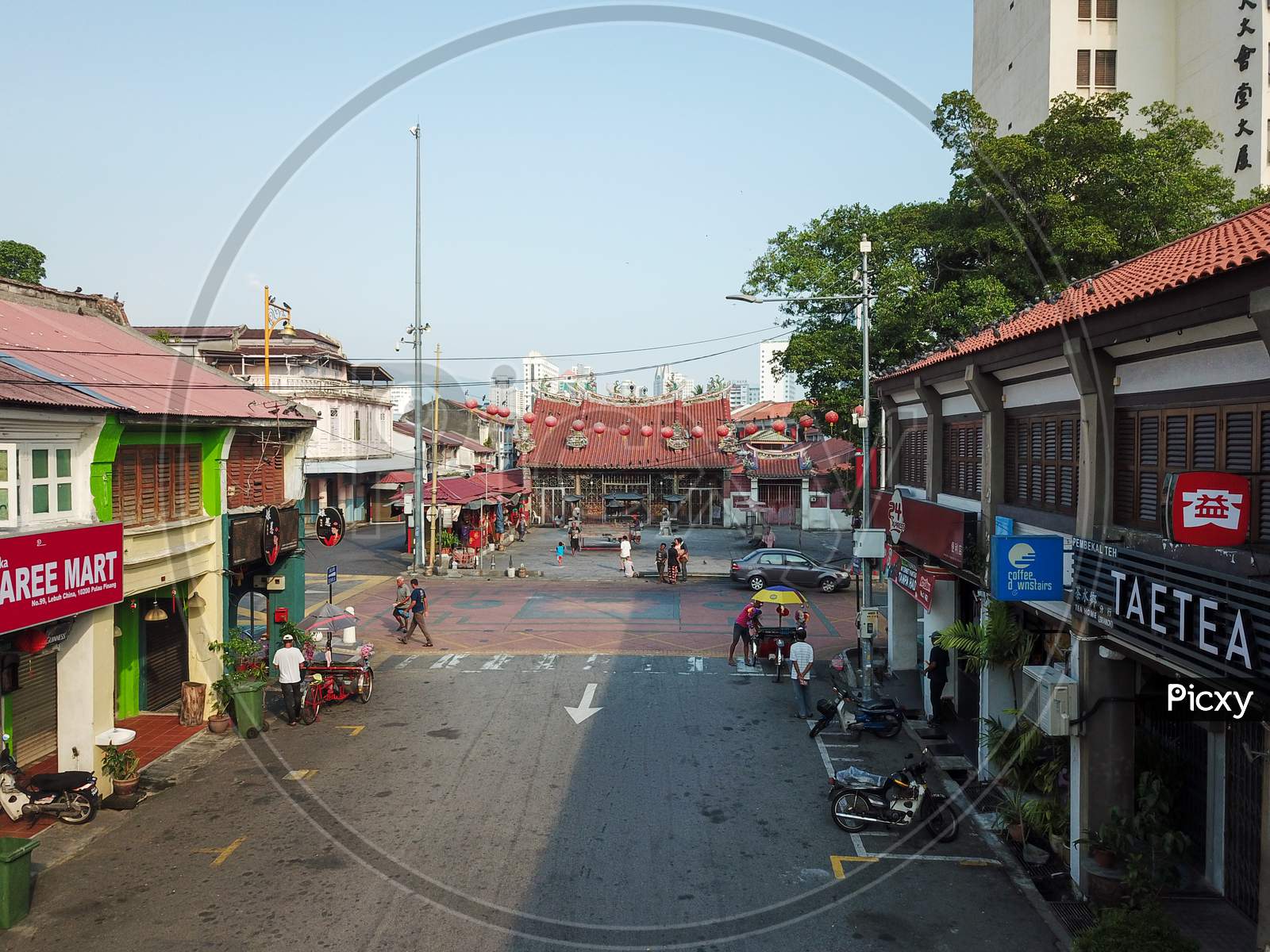 Street Lebuh China In Morning. Background Is Goddess Of Mercy Temple