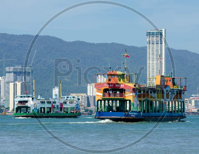 Two Ferry Move At Penang Sea
