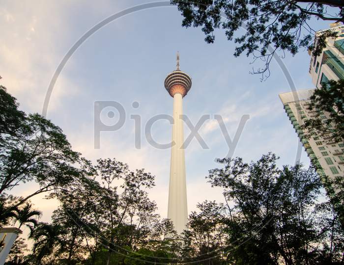 View Of Skyline Kuala Lumpur Over The Green Tree In Morning