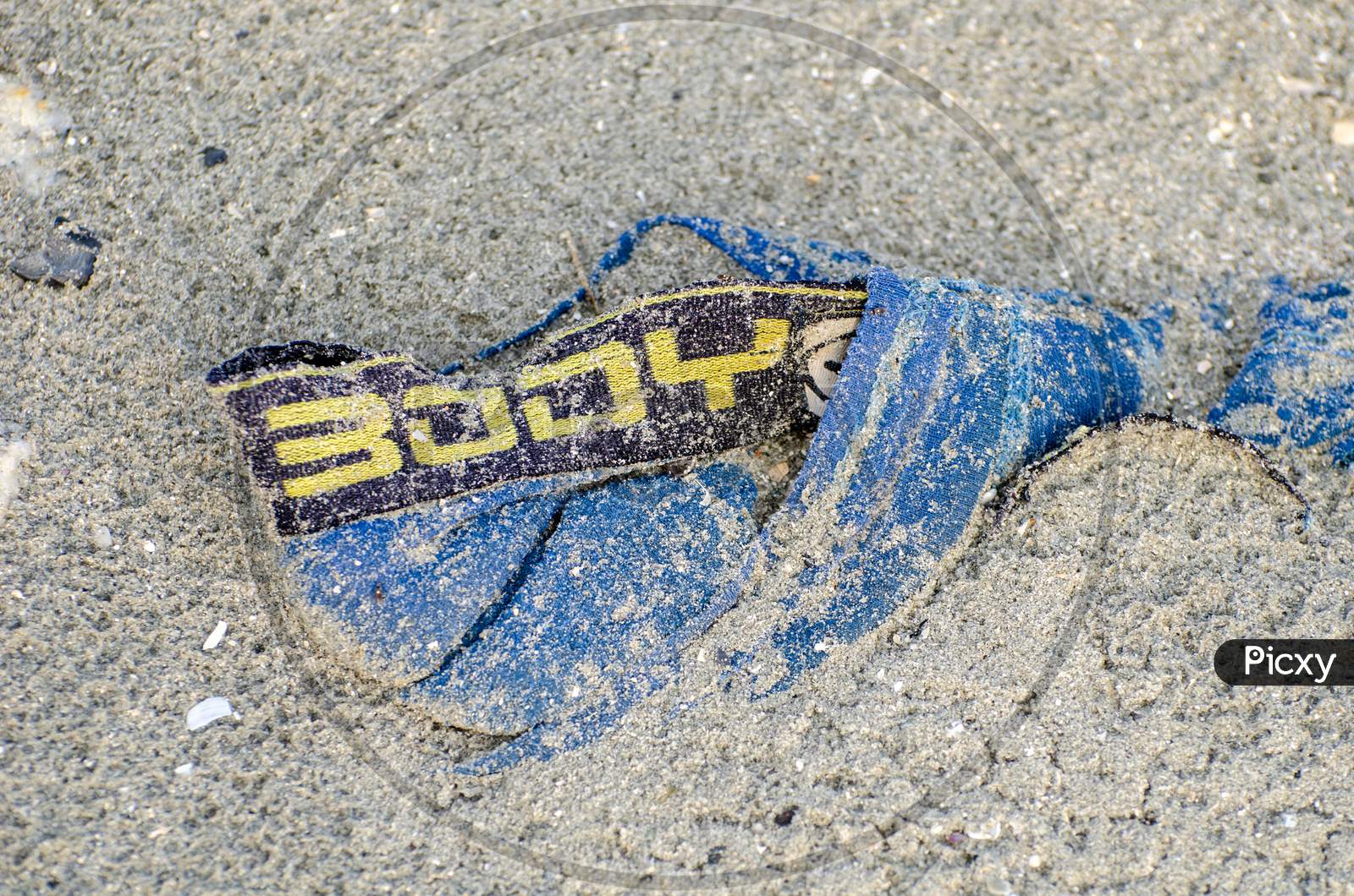 Image of Body Glove Underwear As Rubbish At Beach-KD342838-Picxy