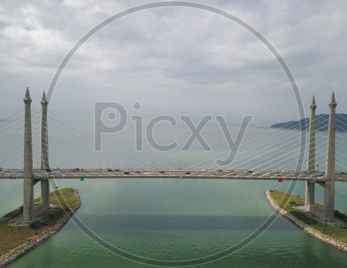 Aerial View Traffic At Penang Bridge In Cloudy Morning