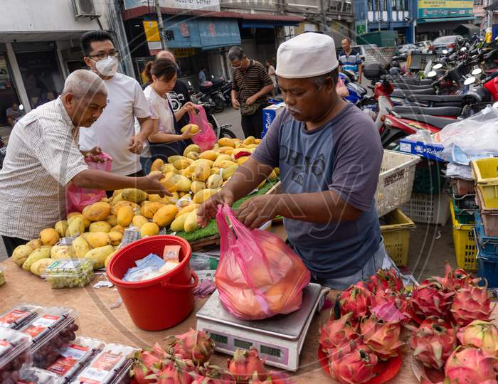 Merchant Sell Fruit In Malaysia Morning Market