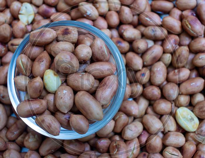Top View Of Roasted Groundnuts. Healthy Snack Rich In Protein.