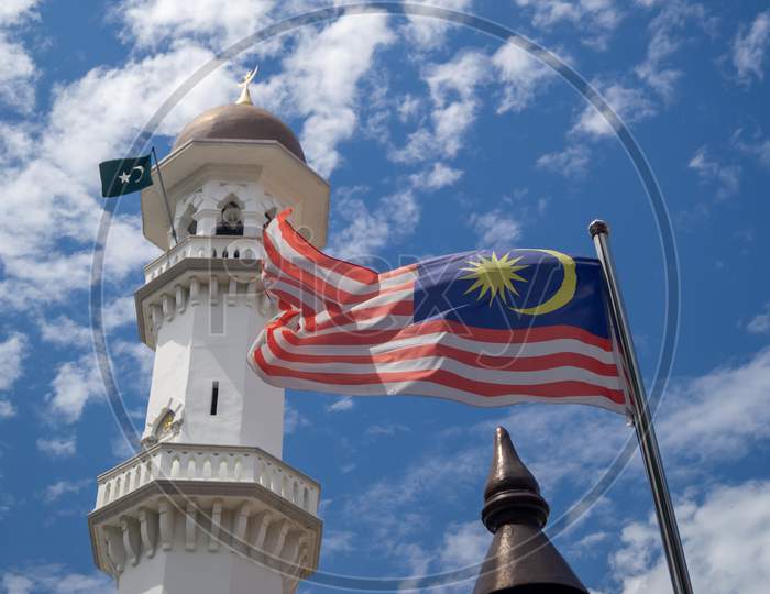 Malaysia Flag Wave At Kapitan Keling Mosque