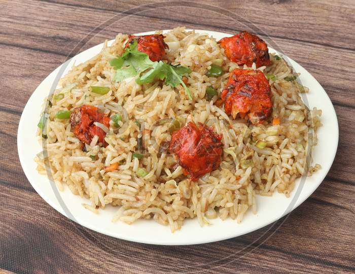 Veg Manchurian Fried Rice, Made Of Fried Mixed Vegetables Balls Along With Rice Is Tossed In Soy Tomato Based Sauce, Indo Chinese Recipe, Selective Focus