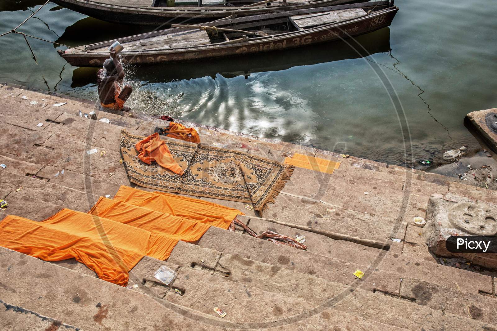 Varanasi, India. Man Bath Himself In The Ganges River