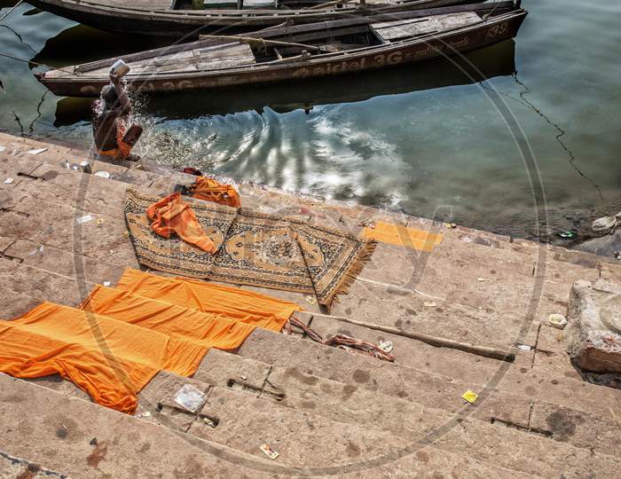 Varanasi, India. Man Bath Himself In The Ganges River