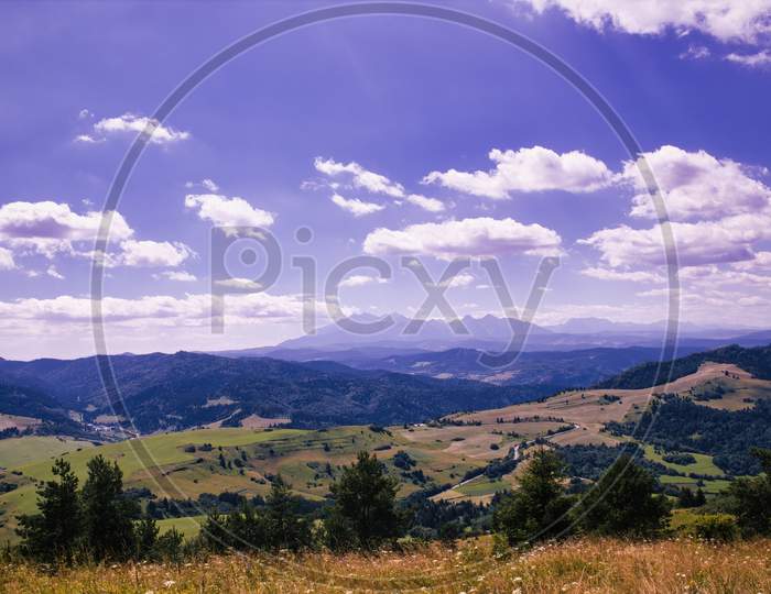 Bielsko Biala, South Poland: Wide Angle View Of Polish Mountains From South In Summer Against Dramatic Clouds. Beskidy Mountains In Silesia Near Slovakia Border.