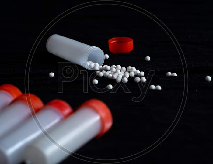 Homeopathy Medicines Coming Out Of A Small Bottle