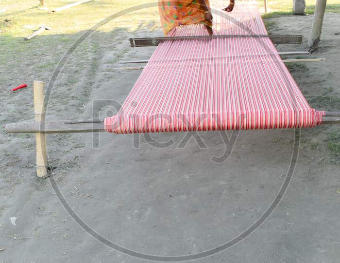 Women busy with Traditional Hand loom  of Assam,india
