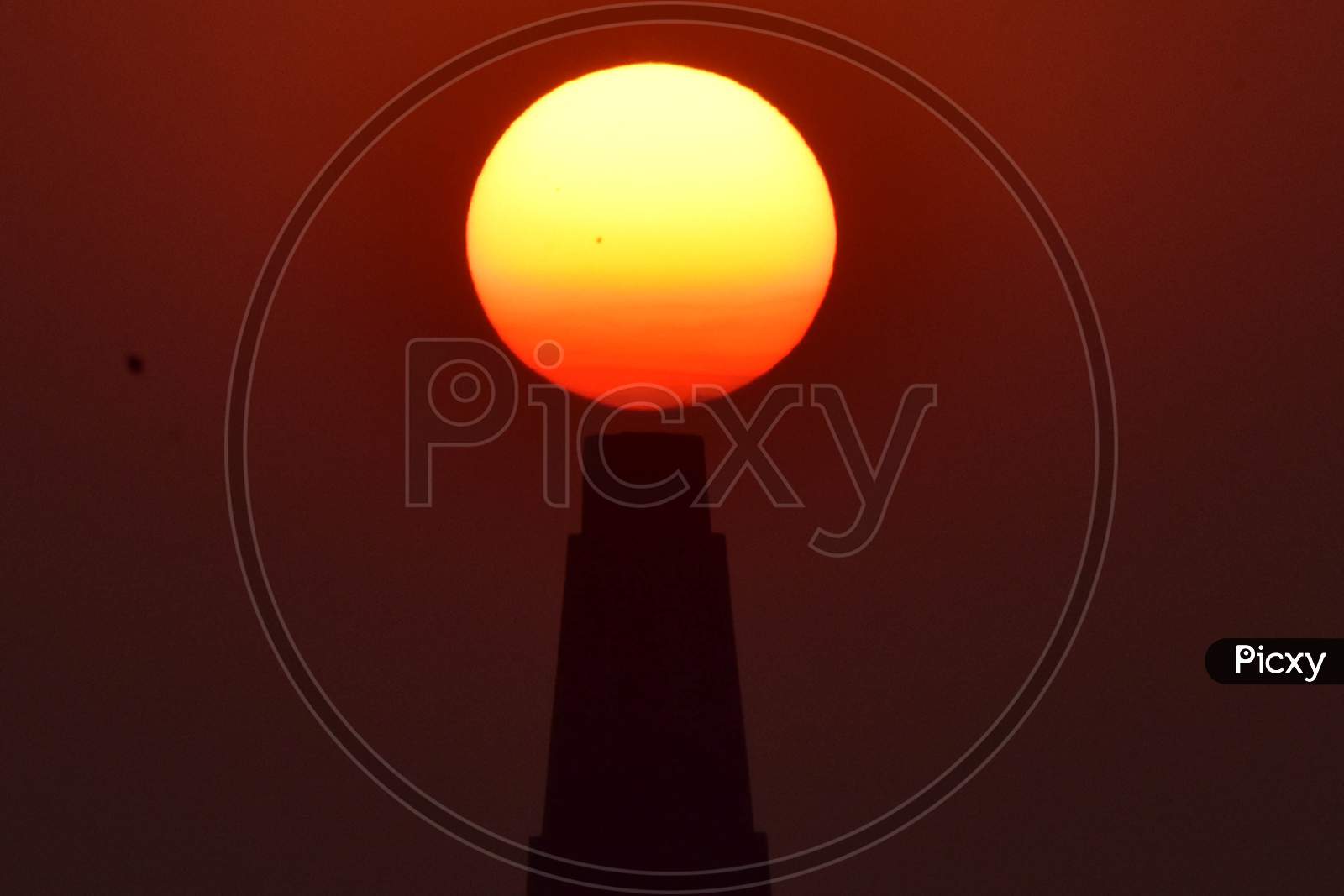 The sun set behind the brick kiln factory  in Assam on Dec 31,2020