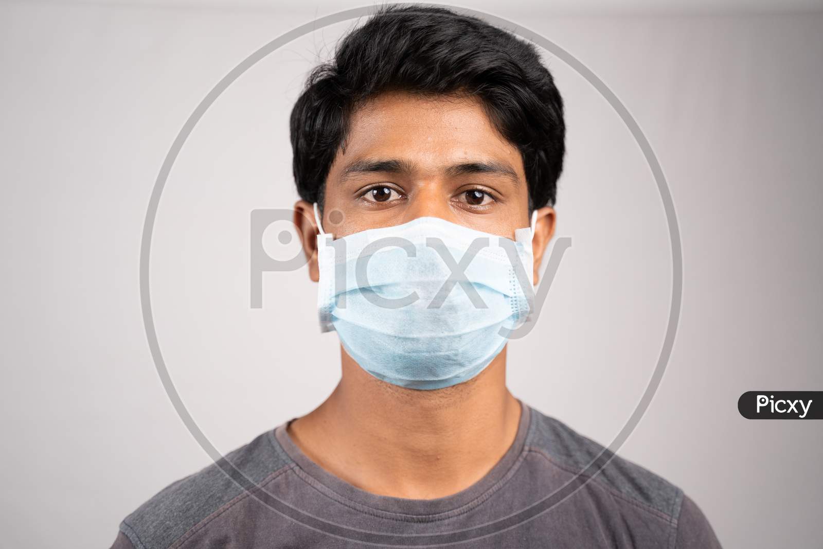 Image of Young Man Properly Covered Nose And Mouth With Face Mask ...