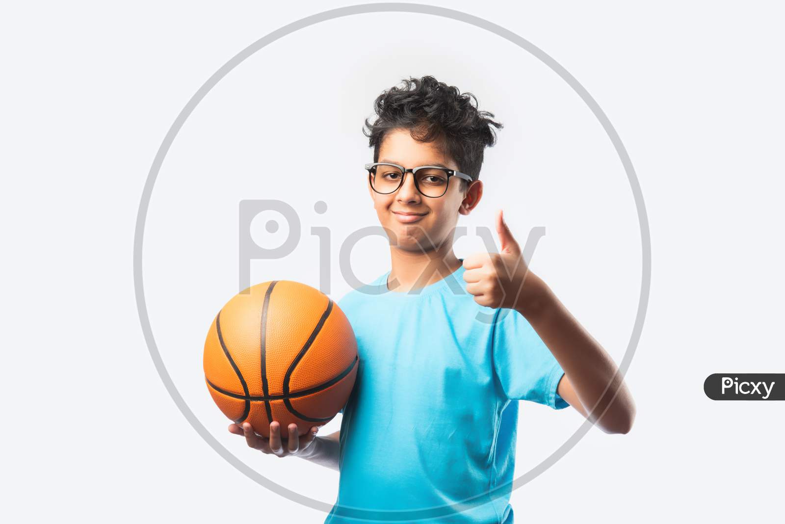 Image of Cute Little Asian Indian Kid Or Boy Playing  Basketball-EM911248-Picxy