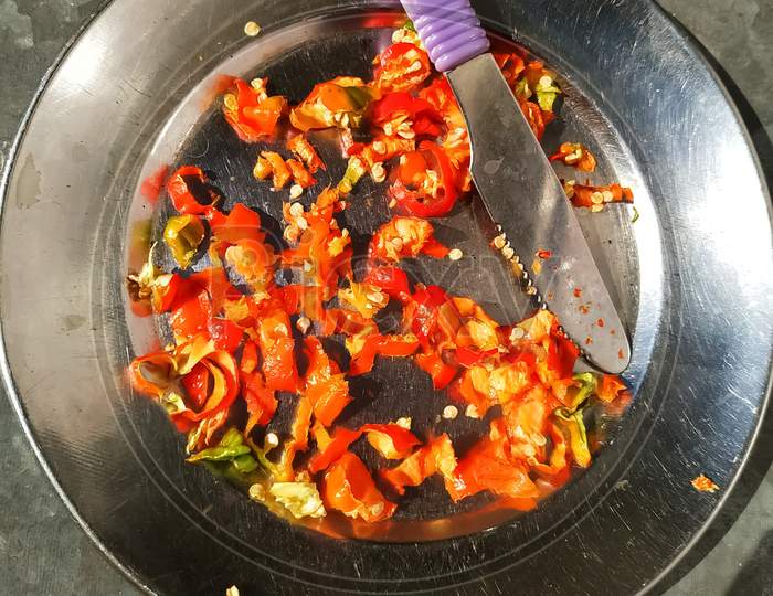 Chopped red chilli peppers on a plate