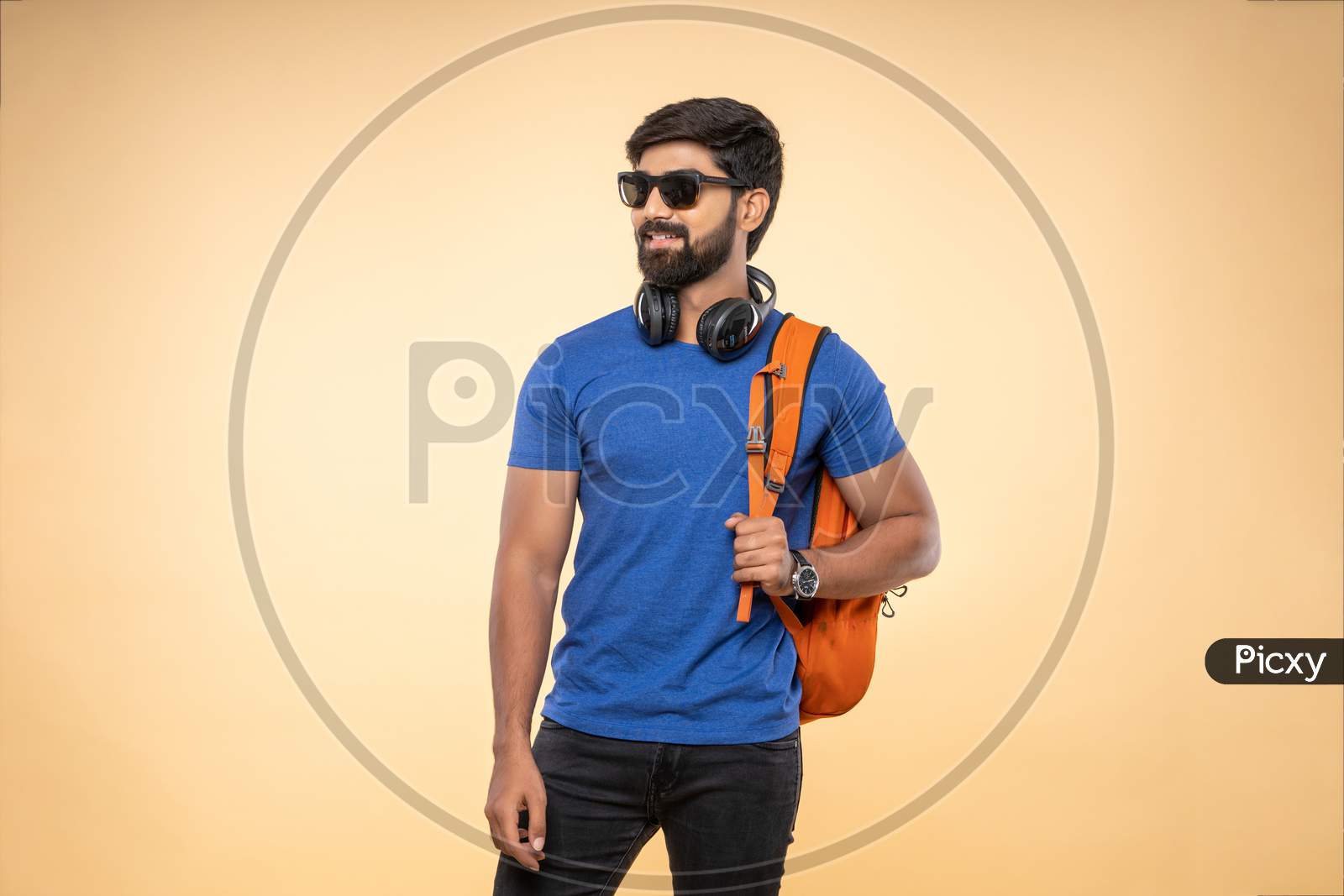Indian young student with backpack , eye wear and backpack