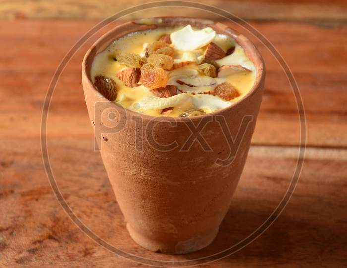 Matka Malai Kulfi Or Clay Pot Malai Kulfi Is A Indian Traditional Ice Cream, Rich In Taste And Creamier,The Malai Flavoured Ice Cream Set To Be Frozen In Clay Pot, That Is Called As Matka Malai Kulfi