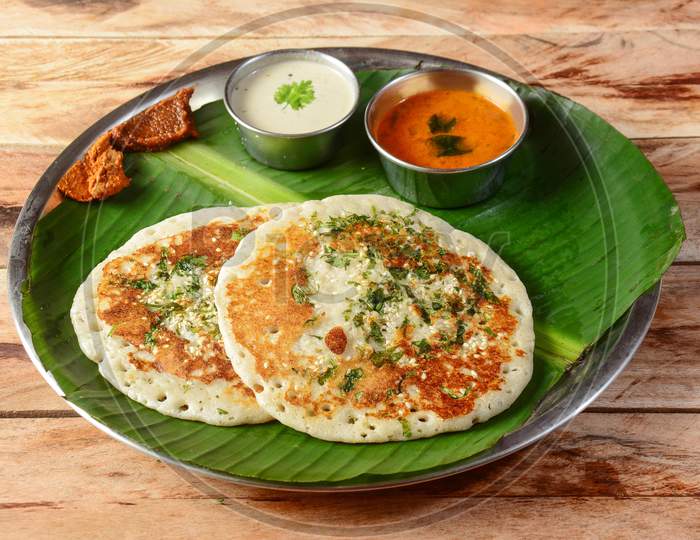 Set Dosa, A South Indian Traditional And Popular Breakfast Served With Chutney And Sambar Over A Rustic Wooden Background, Selective Focus