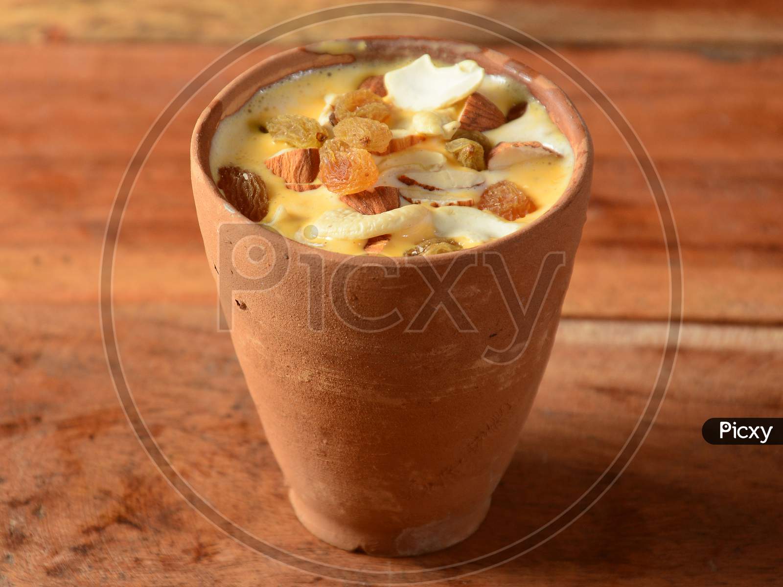 Matka Malai Kulfi Or Clay Pot Malai Kulfi Is A Indian Traditional Ice Cream, Rich In Taste And Creamier,The Malai Flavoured Ice Cream Set To Be Frozen In Clay Pot, That Is Called As Matka Malai Kulfi