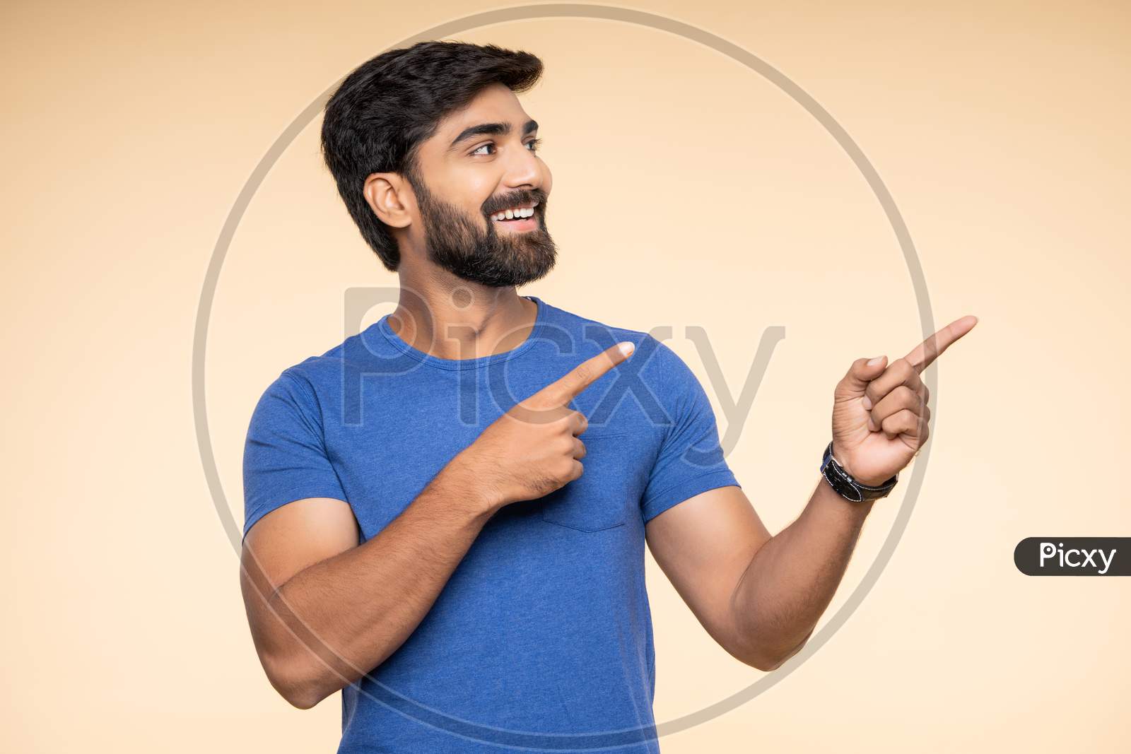 Indian young man smiling with excitement