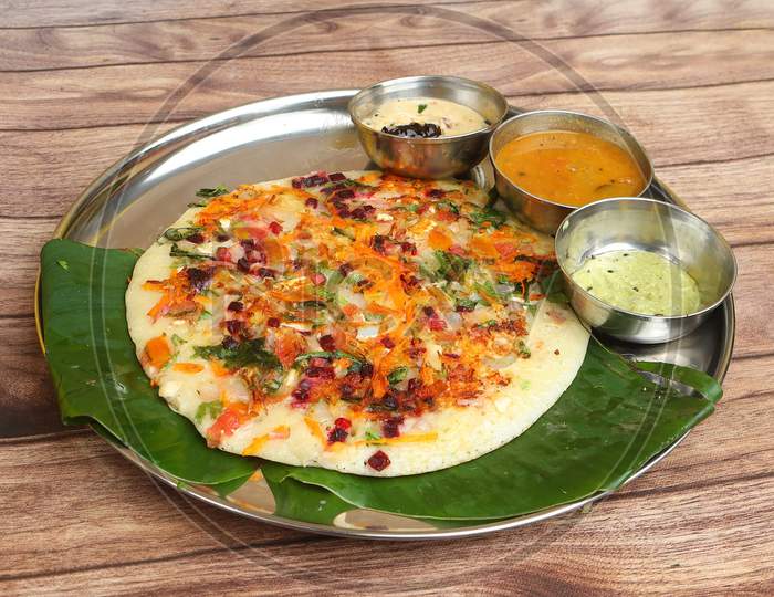 Famous South Indian Food Uttapam Or Ooththappam Is A Dosa Like Dish Made By Dosa Batter, Served With Coconut Chutney And Sambar, Selective Focus