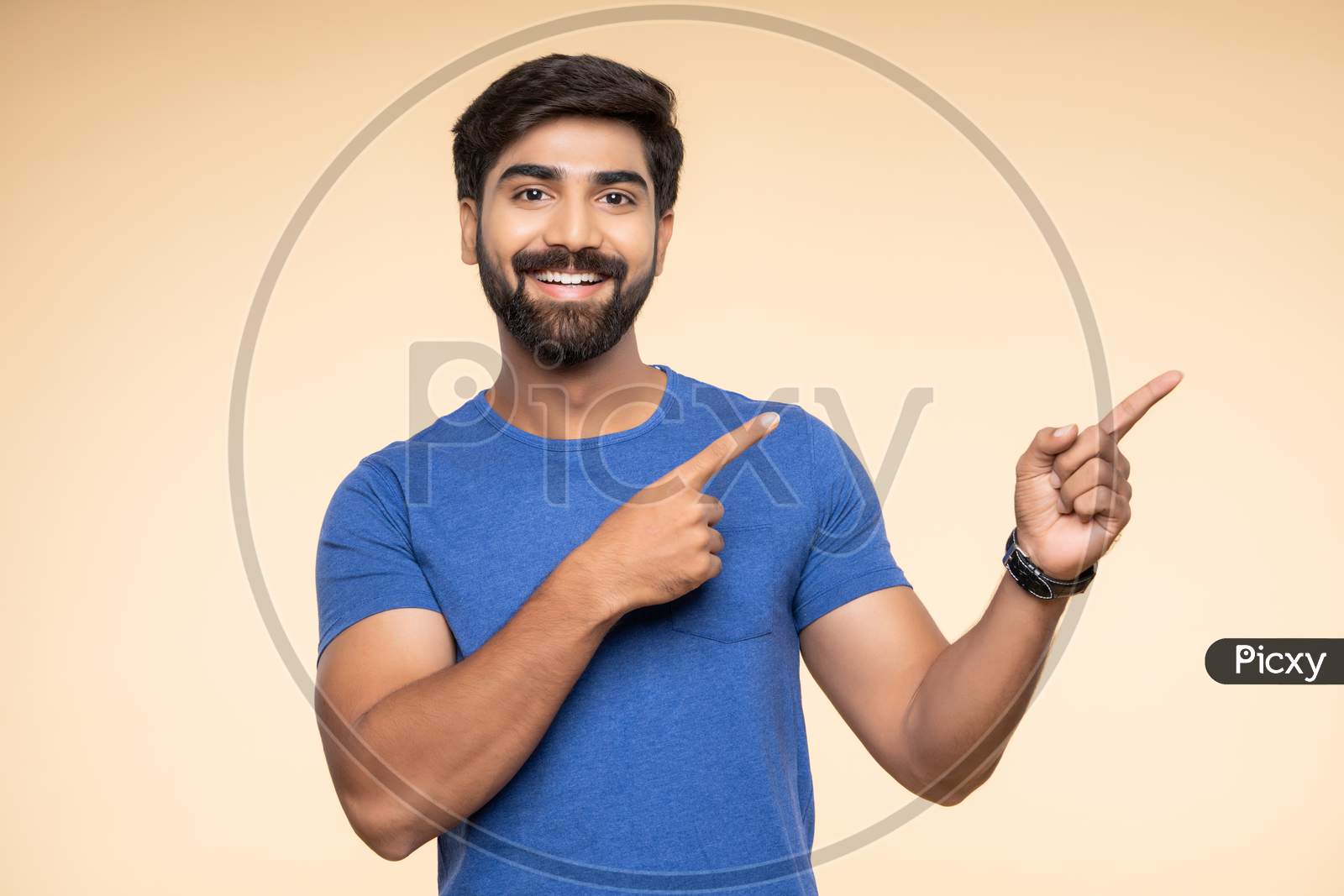 Indian young man smiling with excitement