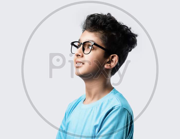 Successful Little Indian Asian Cute Boy With Glasses Against White Background