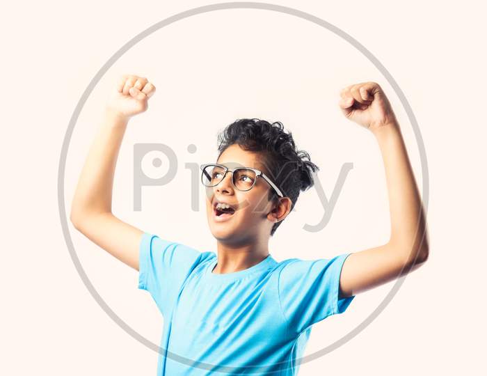 Successful Little Indian Asian Cute Boy With Glasses Against White Background