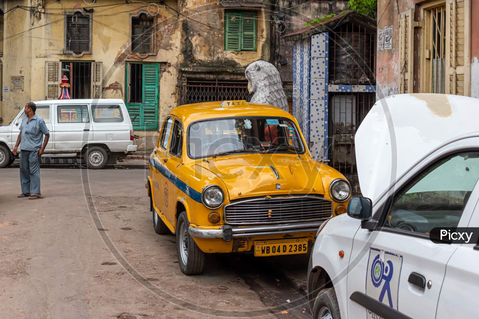 Picture Of A Yellow Taxi Parking At Vintage Lane Streets In North Kolkata, India On October 2020