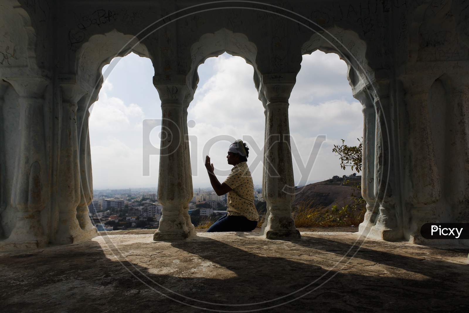 Image of Devotee offering namaaz at moula ali hill dargah-MV814278-Picxy