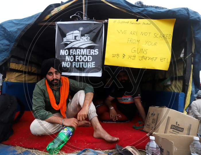 Farmers gathered at Singhu Border continue their protest against farm reform laws at Singhu border on December 6, 2020 near New Delhi, India.