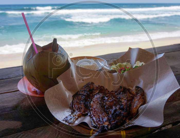 Delicious Foods In The Beach With An Oceanfront View