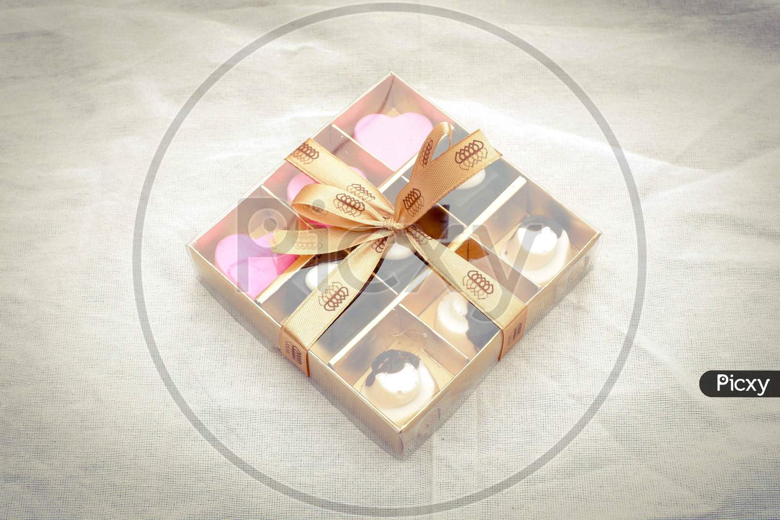 a chocolate box gift of various shapes for present