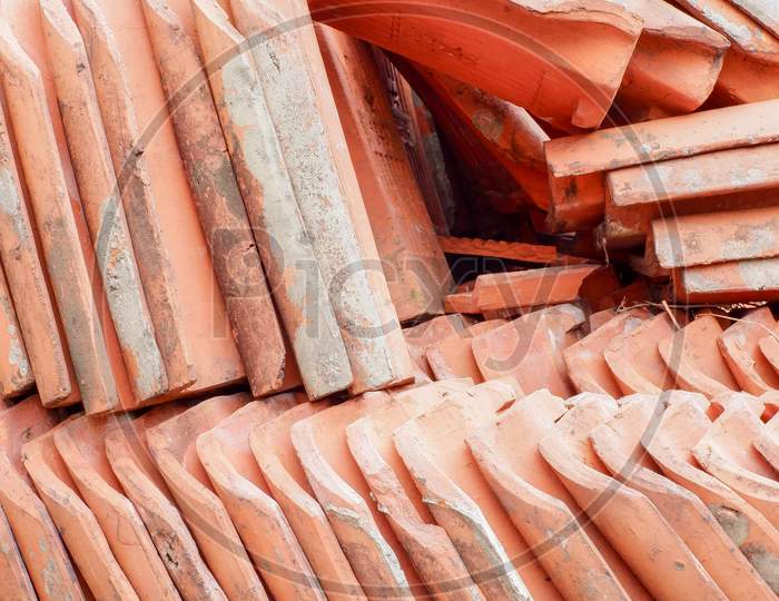 Vintage classic orange roof tiles of old houses