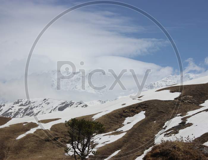 Snow covered slopes of himalaya