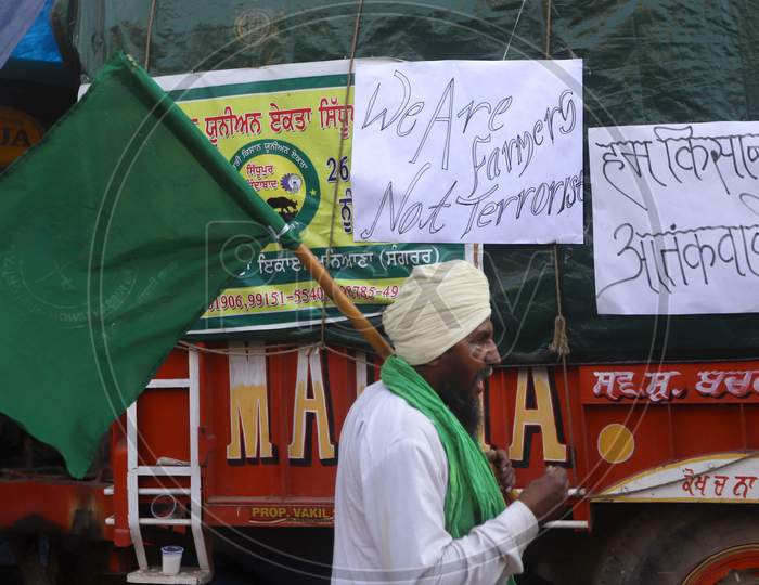 A farmer protestd against the newly passed farm bills at the Delhi-Haryana border near Tikri. Hundreds of farmers blocked a highway during their nationwide protest against the newly passed farm bills at the Delhi-Uttar Pradesh border in New Delhi on Decemb