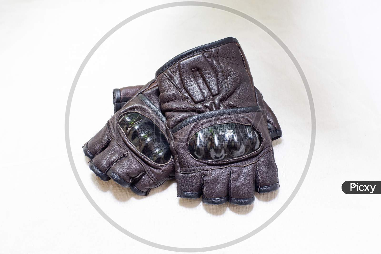 Brown Leather Gloves For Biker With Protection In White Background