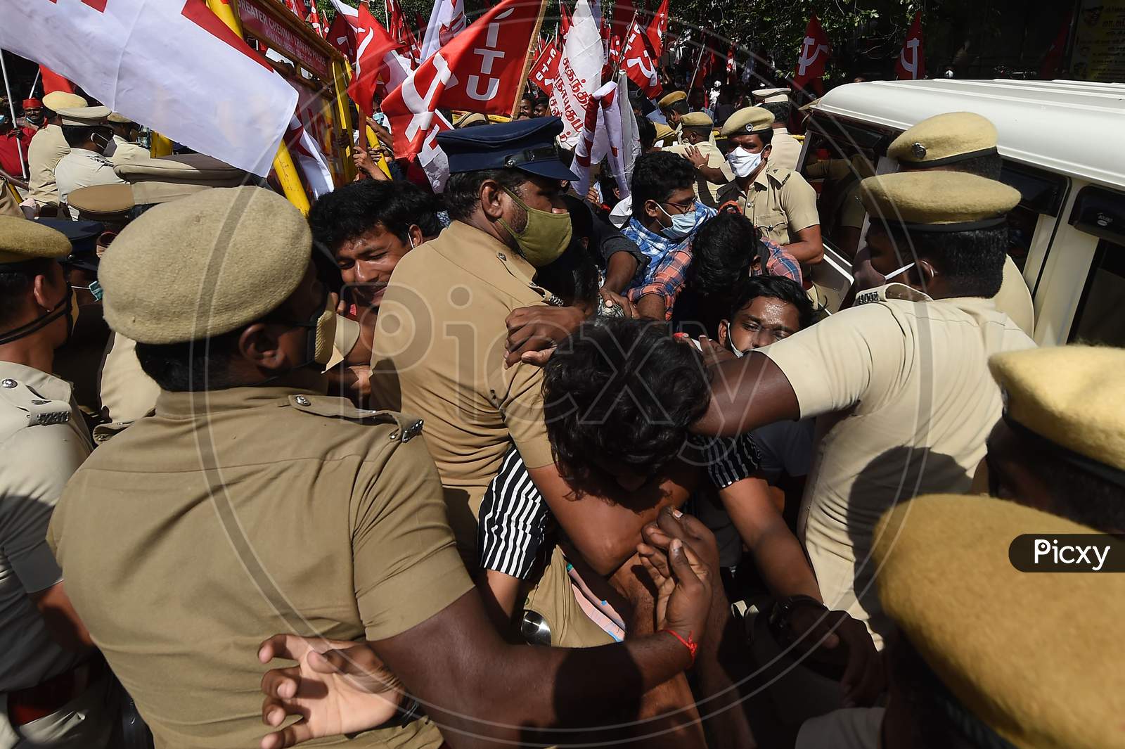Communist Party Of India (Cpi) Activists And Supporters Scuffle With Police During A Demonstration Supporting A Nationwide General Strike Called By Farmers To Protest Against The Recent Agricultural Reforms In Chennai On December 8, 2020.