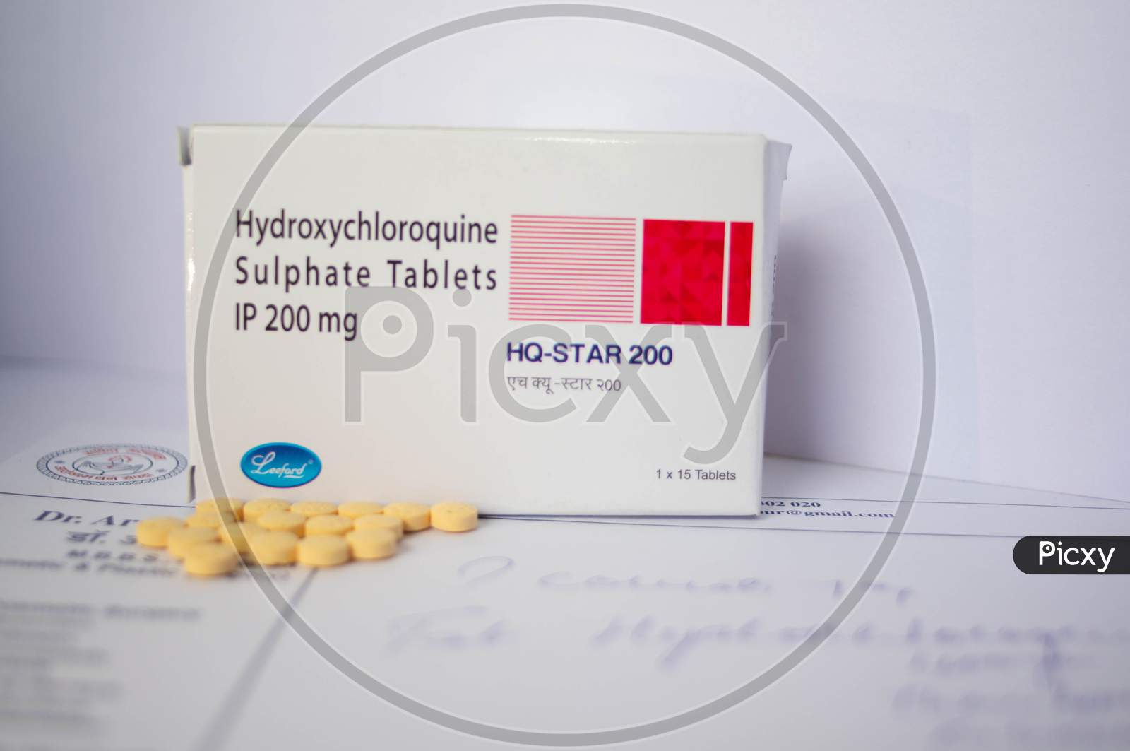 A Box Of Hyroxychloroquine Tablets On A Prescription Paper
