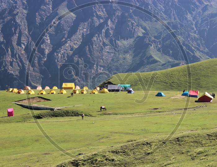 A campsite view in a Alpine meadow of himalaya.