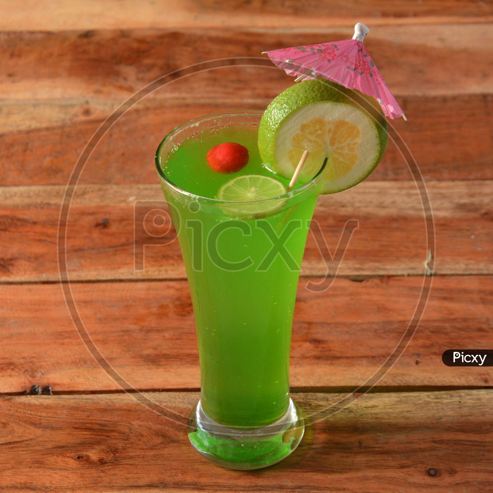 Lime Mint Cooler Served In A Glass Over A Rustic Wooden Background,A Refreshing Drink For Summer Days, Selective Focus On Top