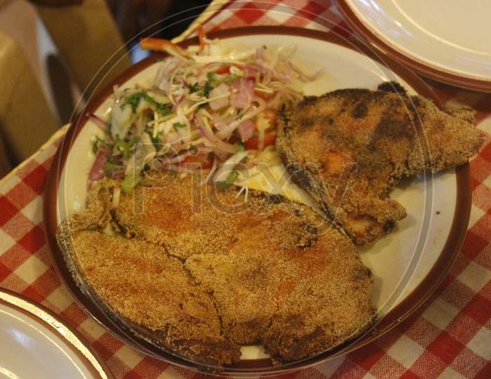 A fish fry served hot, Goan meal