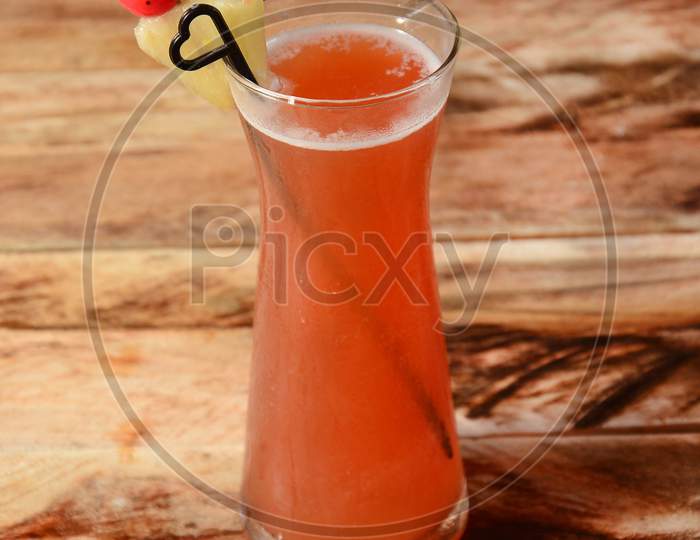 Watermelon Mojito Served In A Glass Over A Rustic Wooden Background,A Refreshing Drink For Summer Days, Selective Focus On Top